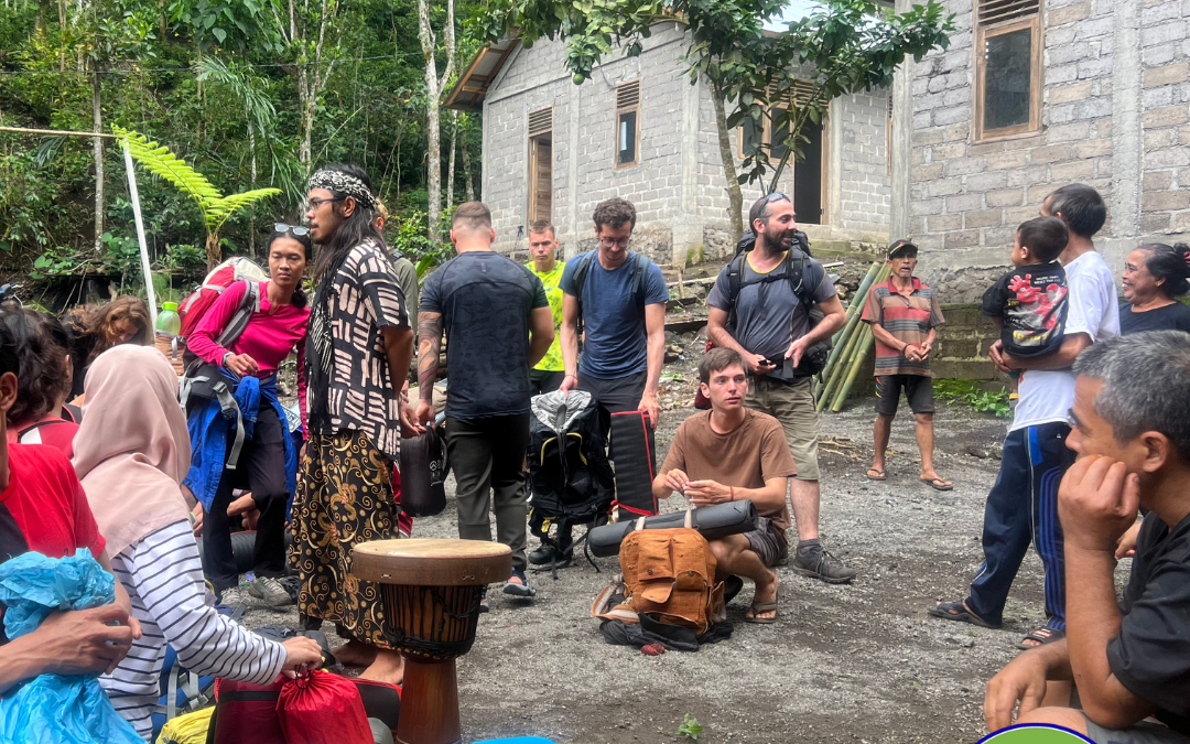 Volunteers Climb Active Volcano Mt. Agung, Bali To Plant Trees And Save Soil